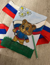 Воспитанник МКОУ "Краснобогатырский ЦО" Чесноков Максим вместе с мамой принимают участие в муниципальной онлайн-акции "Горжусь флагом любимой страны".